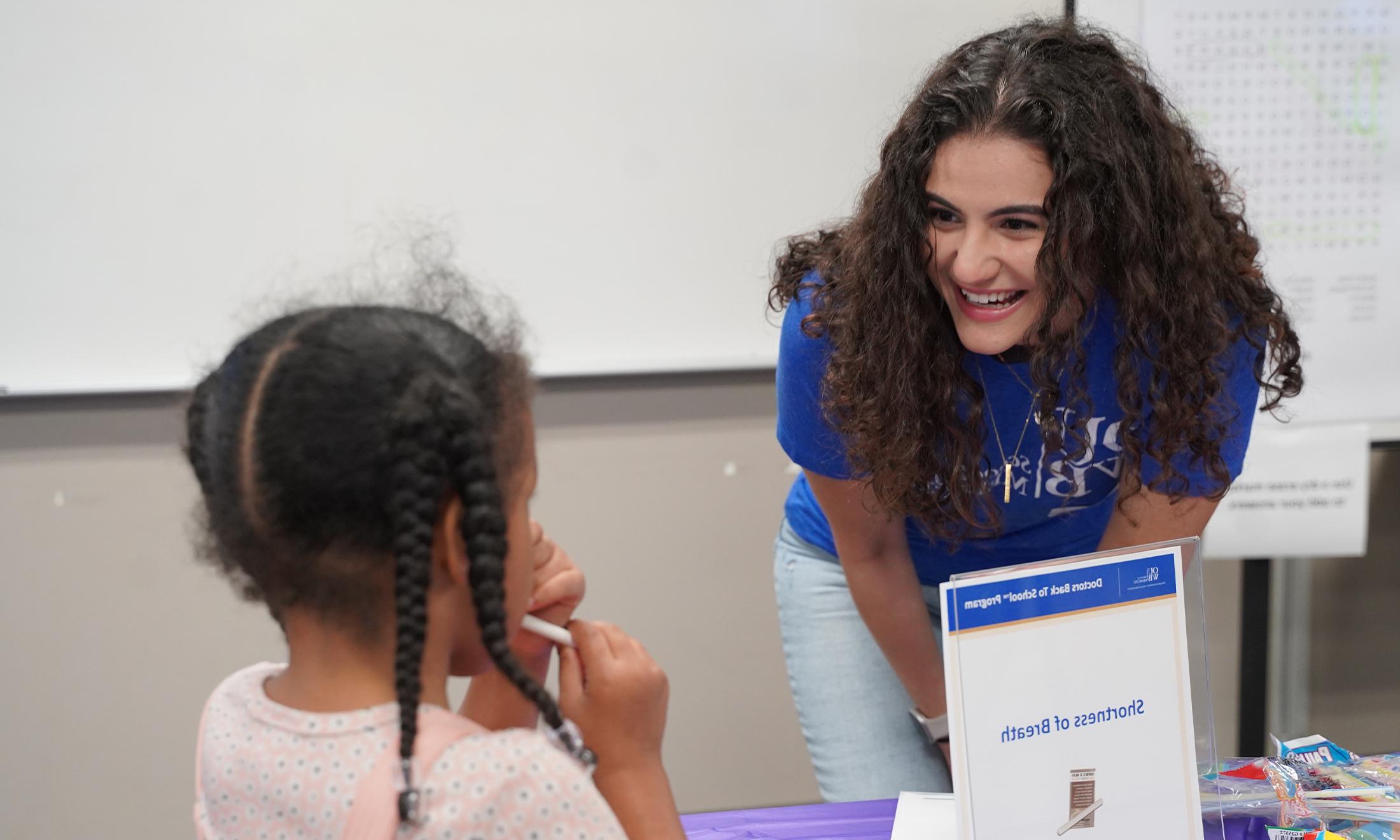 An image of an OUWB student at the Doc for a Day event