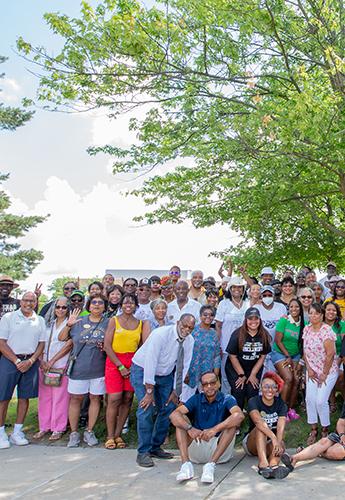 Group of people standing together outside